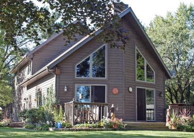 Exterior of house with large windows